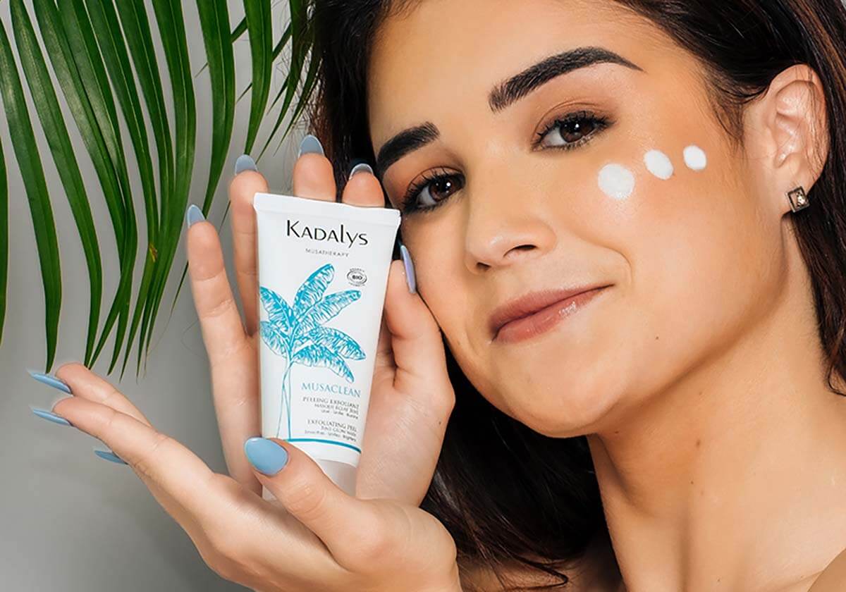 Woman with chemical and manual exfoliation product