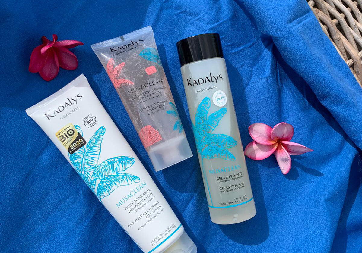 Kadalys cleanser and makeup removers on a blue blanket