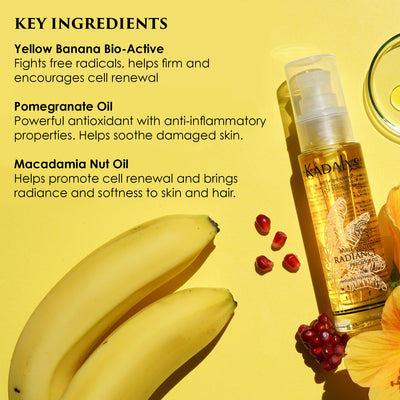 Image of radiance dry oil on a yellow background next to bananas and pomegranates. Caption notes key ingredientsL Yellow banana bio-active, pomegranate oil, and macadamia nut oil.