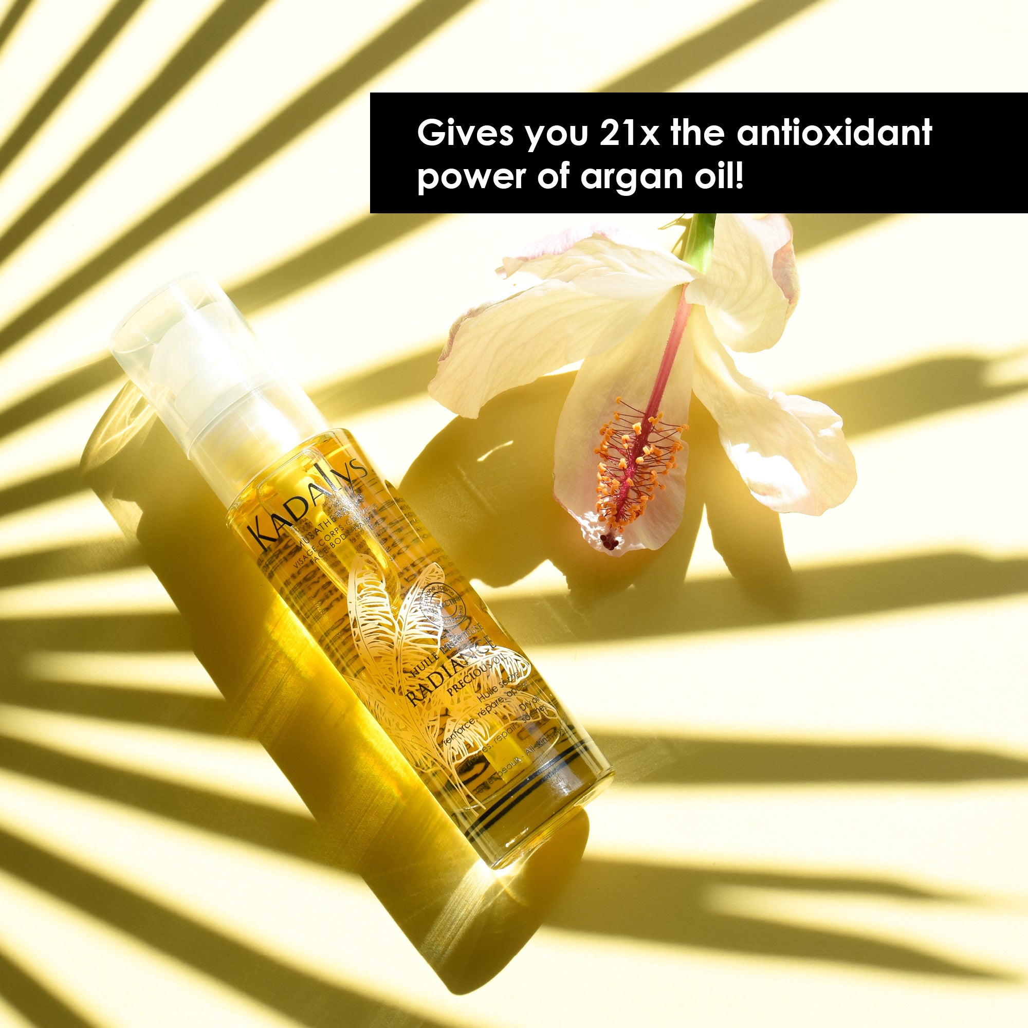 Image of Radiance oil against shadows of plant leaves.  Text reads: 21x the antioxidant power of argan oil.